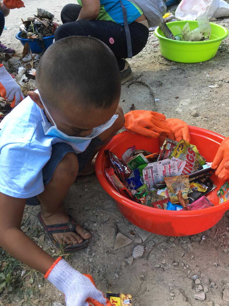 A little boy helps identify brands